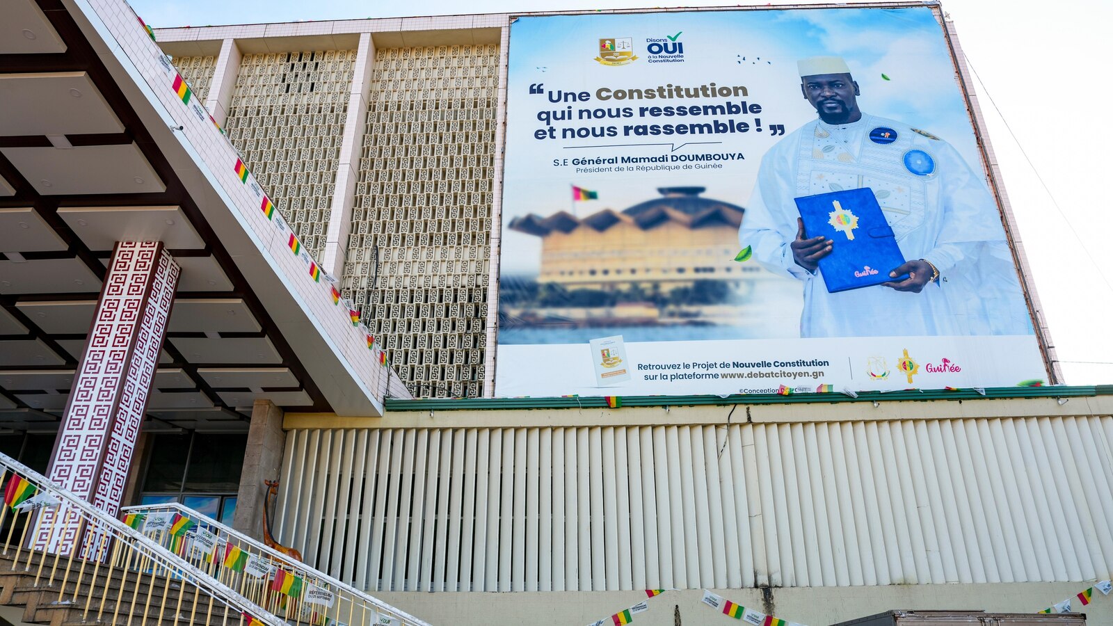 Polls open in Guinea in a referendum that could allow junta leader to run for president